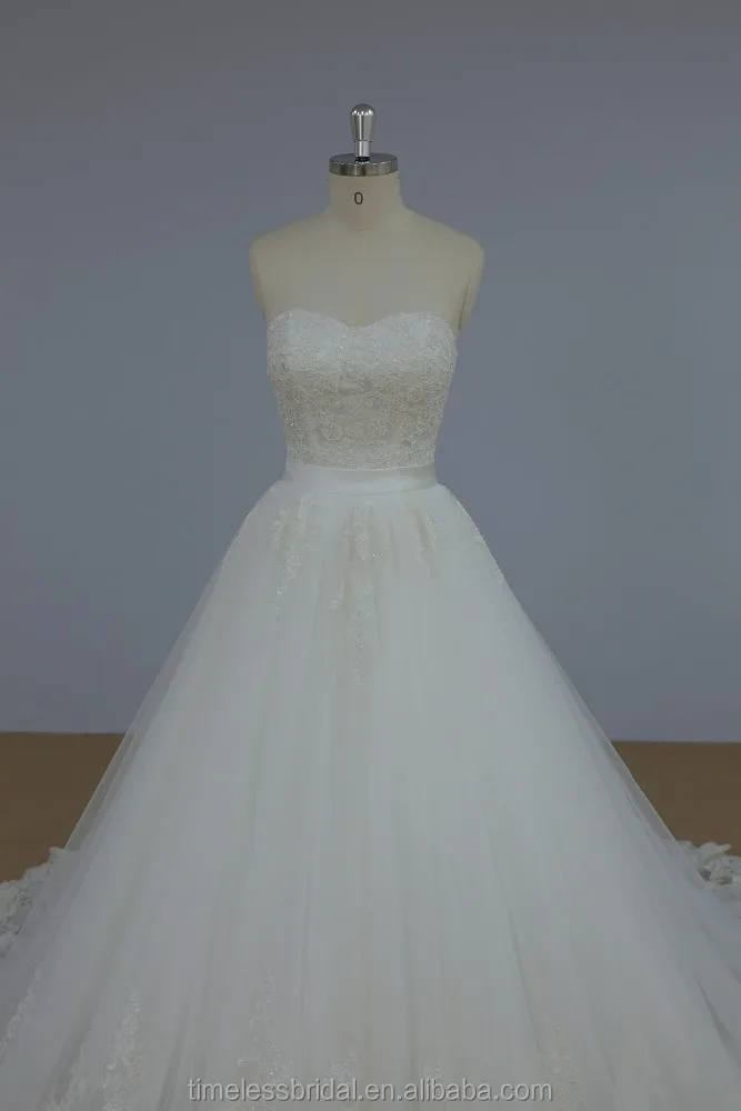 Latest lace wedding dress with detachable skirt