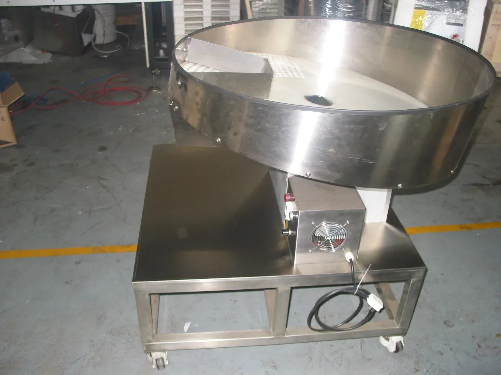 Round Plate PCM 1000  paintball countting and packing machine for the paitnball  encapsulation production line