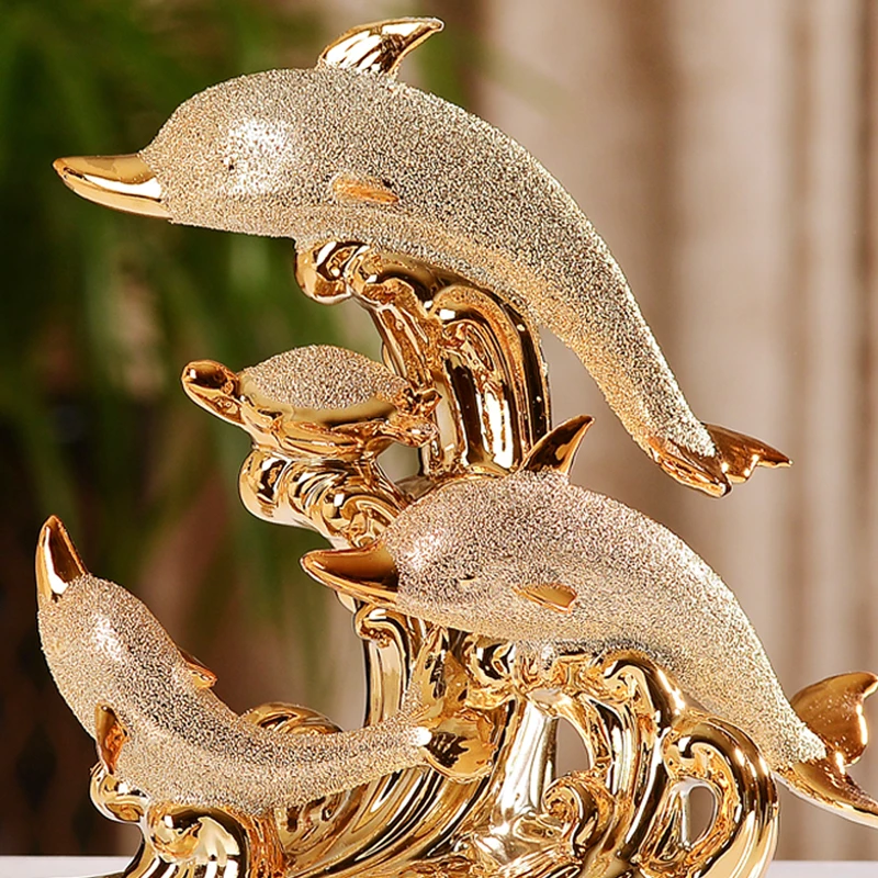 
Fashionable design gold color plated custom ceramic dolphin statues 