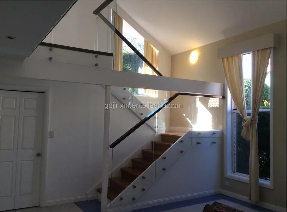 
Frameless glass balustrade side fixed pinned glass with stainless steel standoffs 