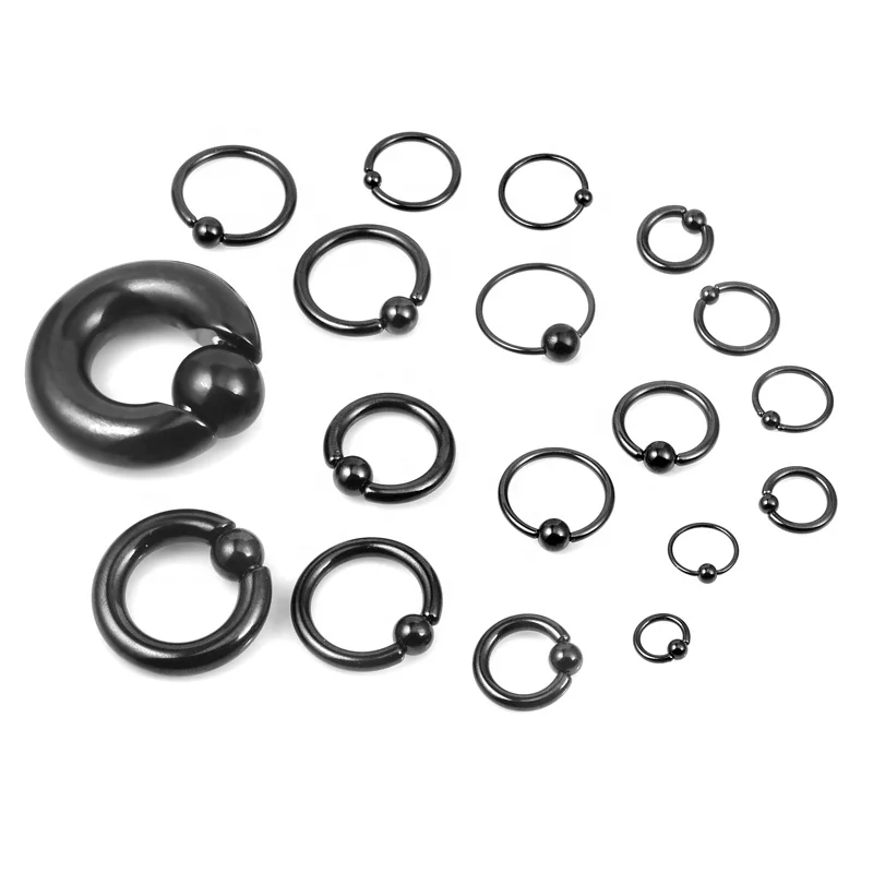 Stainless steel piercing jewelry heavy large gauge spring loaded snap fit ball closure ring