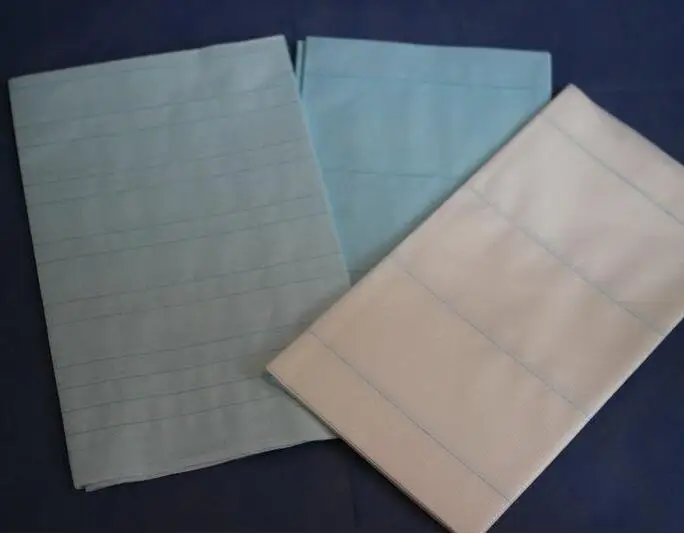 Disposable surgical bed draw sheet with and without threads