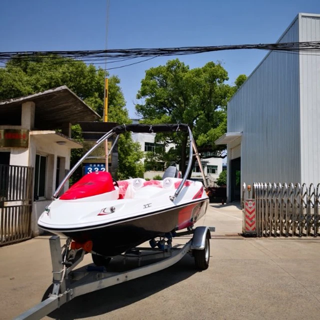 Seadoo outboard type red 4 seats rowing boat with trailer