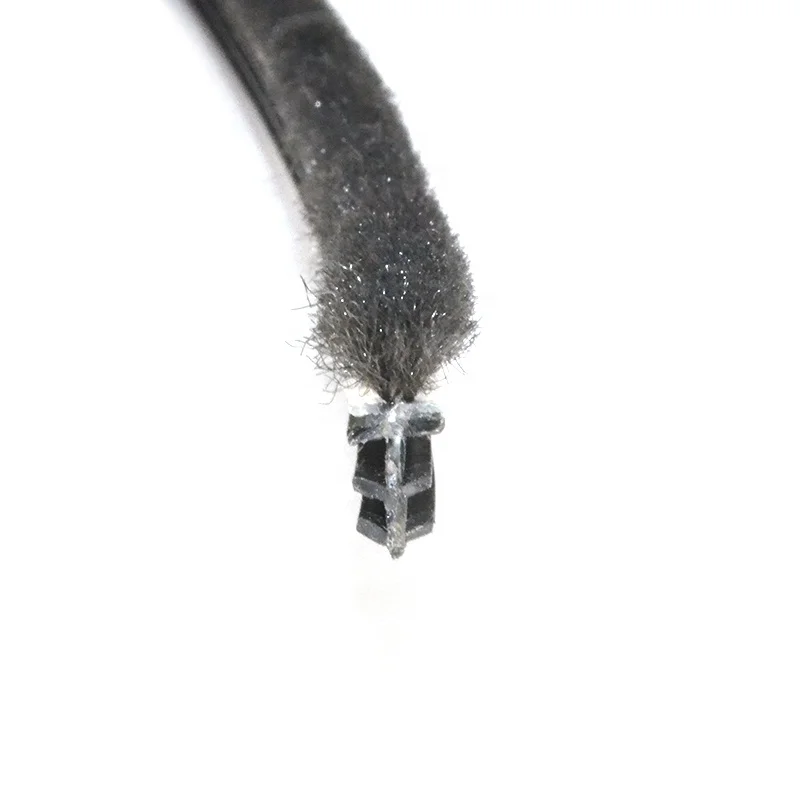 Kerf mounted pile weatherstripping