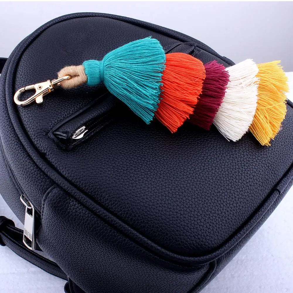 very popular  Handmade bohemian style pom pom tassel