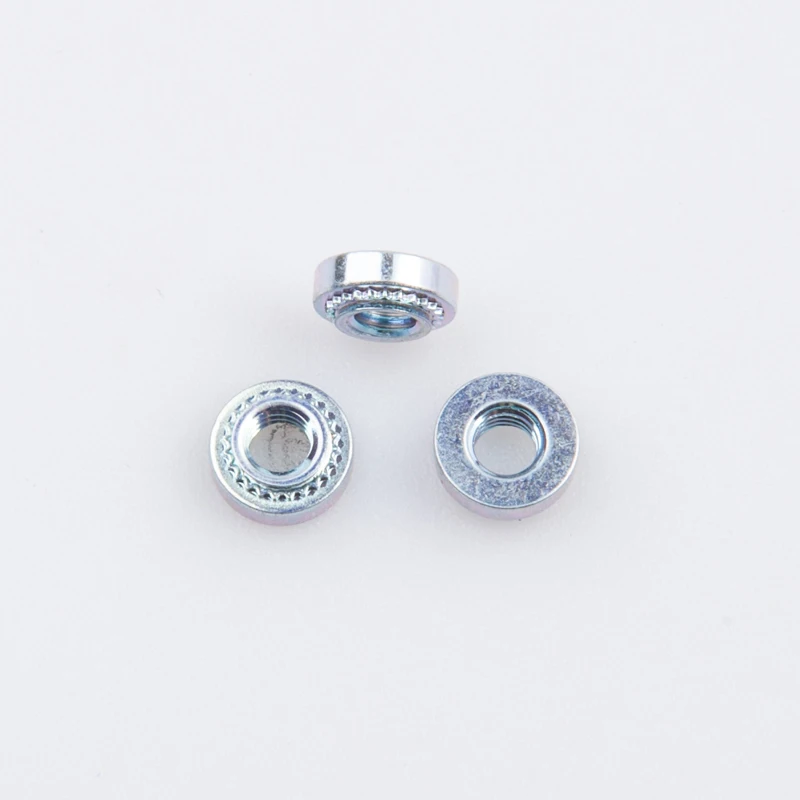 China Manufacturer Carbon Steel Zinc Plated Clinching Nuts