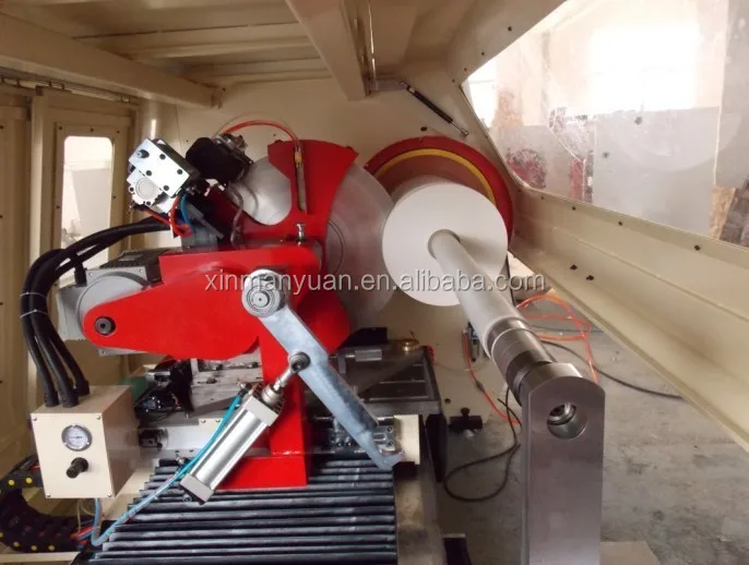 Huge type automatic roll slitter or cutter for textiles, nonwoven, fiberglass fabric rolls. Tapes & ribbons.