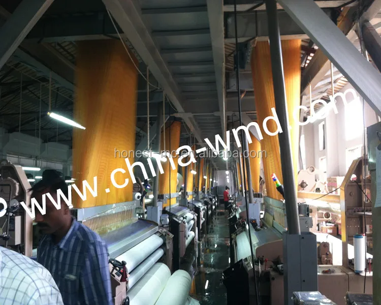 Electronic jacquard water jet loom weaving polyester fabric with high speed