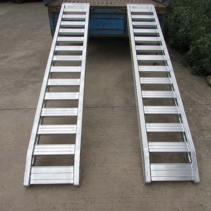 Aluminum loading ramps used for Kubota excavators