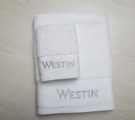 White towels with logo for Westin hotel