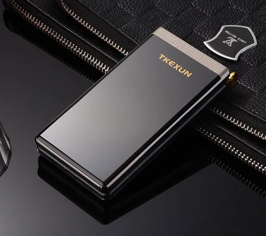 
Dial SOS Metal Body Senior Cell Phone TKEXUN M2 Flip Touch Screen 3.0