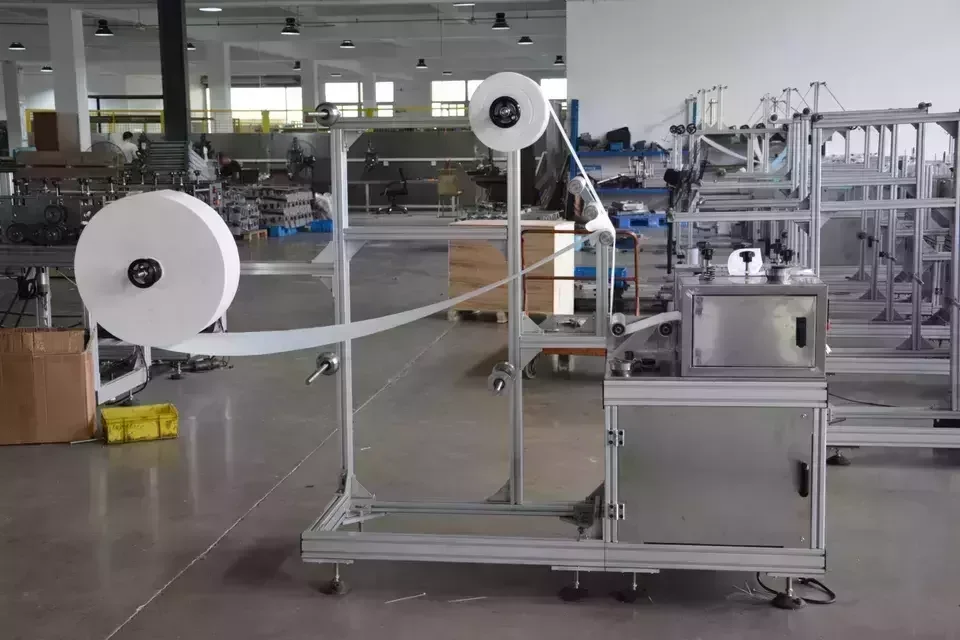 China Automatic Professional Ultrasonic Sanitary Pads Making Machine Feminine Sanitary Napkin Machine