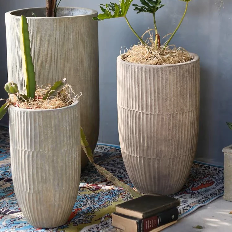 Hot selling home hotel decoration planter flower fibre clay pot garden fibreglass plant pots.JPG