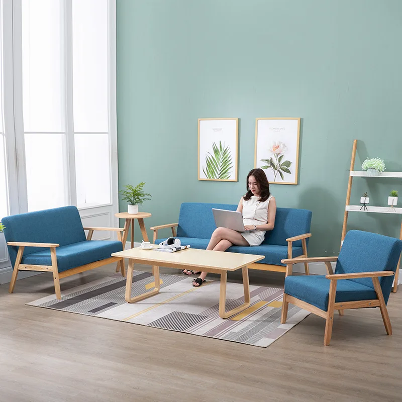 Small family simple modern pine sofa new pastoral cloth double single living room solid wood Japanese simple sofa chair set