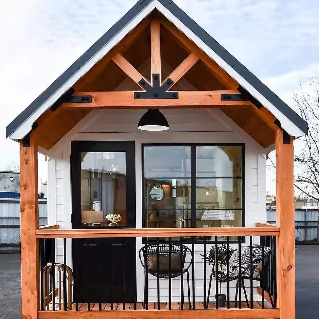 Winterized tiny cabin house with steel structure on wheels
