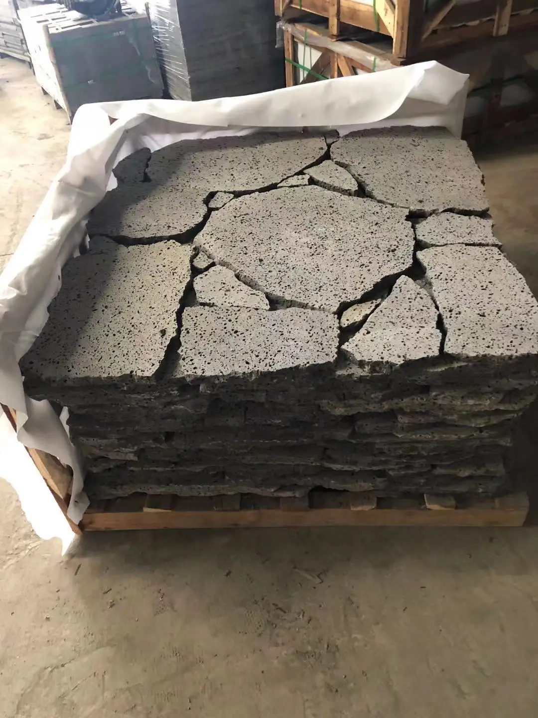 Customized Honed Finish Big Hole Type China Volcanic Black Basalt Lava Stone Slabs And Tiles