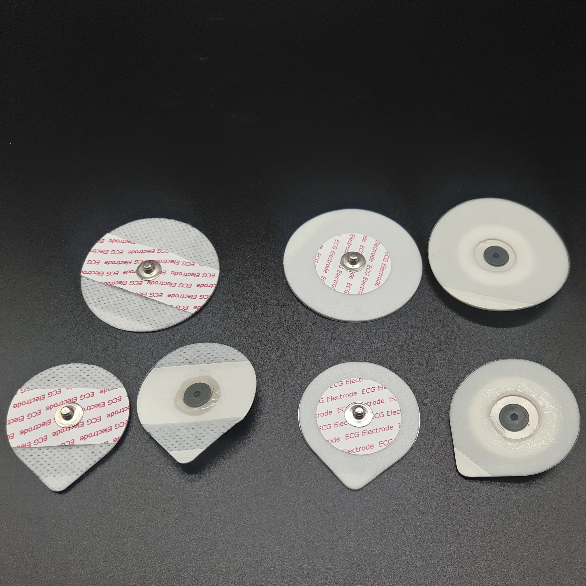 Disposable foam and nonwoven ecg electrode medical electrode pads