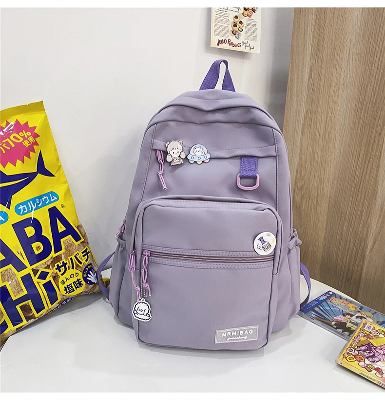 Hot sale new design large capacity cheap waterproof nylon teenagers school bags wholesale custom logo backpack