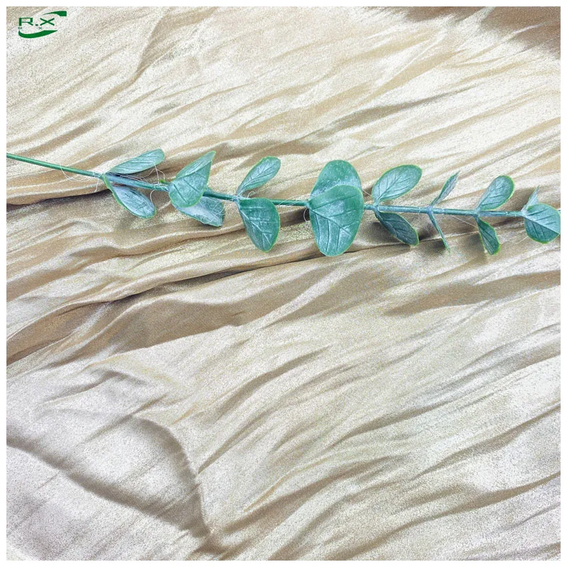 Manufacturers custom wholesale high quality luxury soft polyester silky metal yellow shiny satin fabrics for clothing women