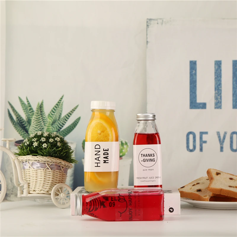 
Disposable PET Plastic Juice Beverage Bottle Square Portable To Go With Transparent Tape Cover To Seal Empty Beverage Bottles 