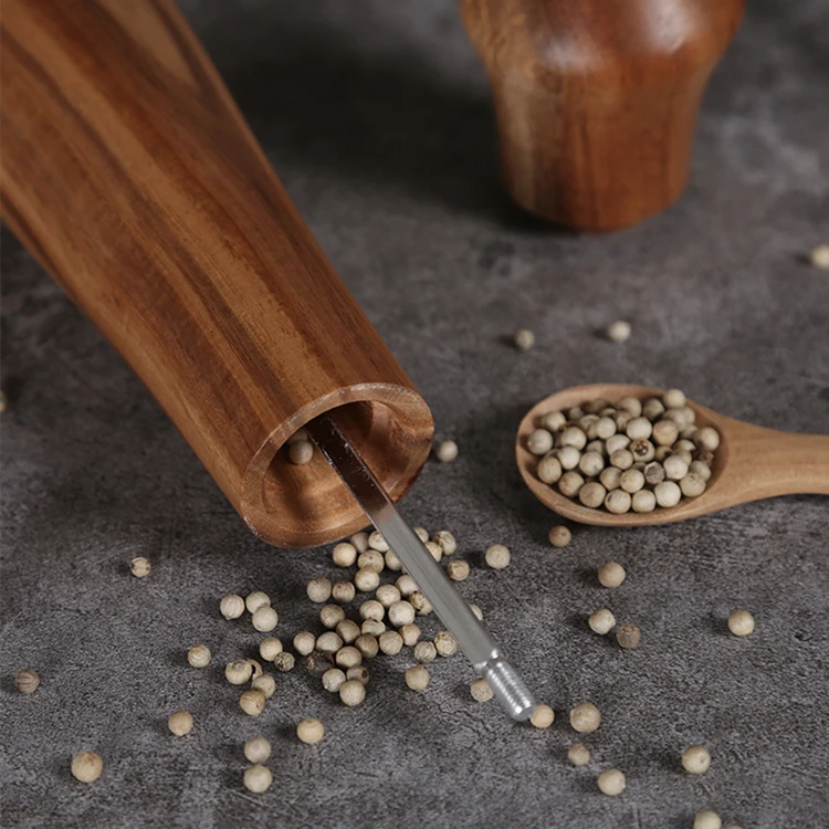 Pepper grinder made of acacia wood and constructed with ceramic core and stainless steel hardware, which makes it use easily