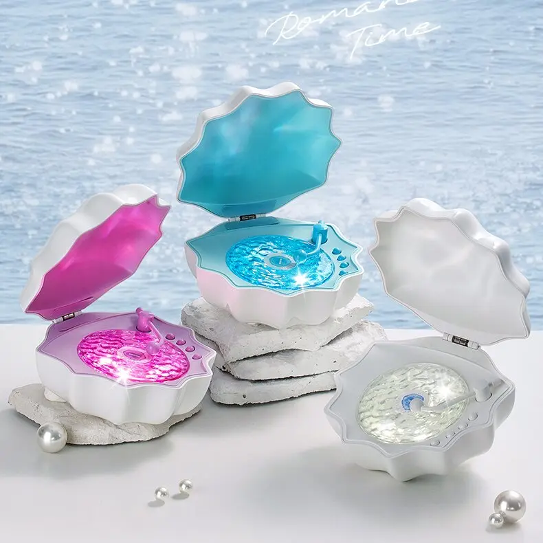 Wireless Portable Shell Shape Speaker with LED Projector Light New Arrival Promotional Home Outdoor Travel Gift Bedroom