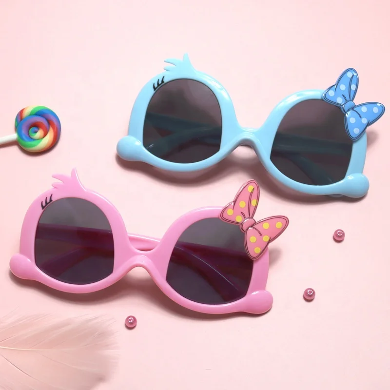 Wholesale lovely cute bow silicone frame polarized uv400 protection duck kids sunglasses (1600215053457)