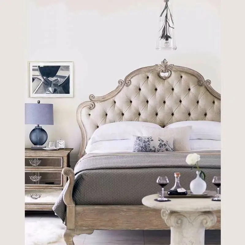 French bedroom with high - end stylish oak double bed