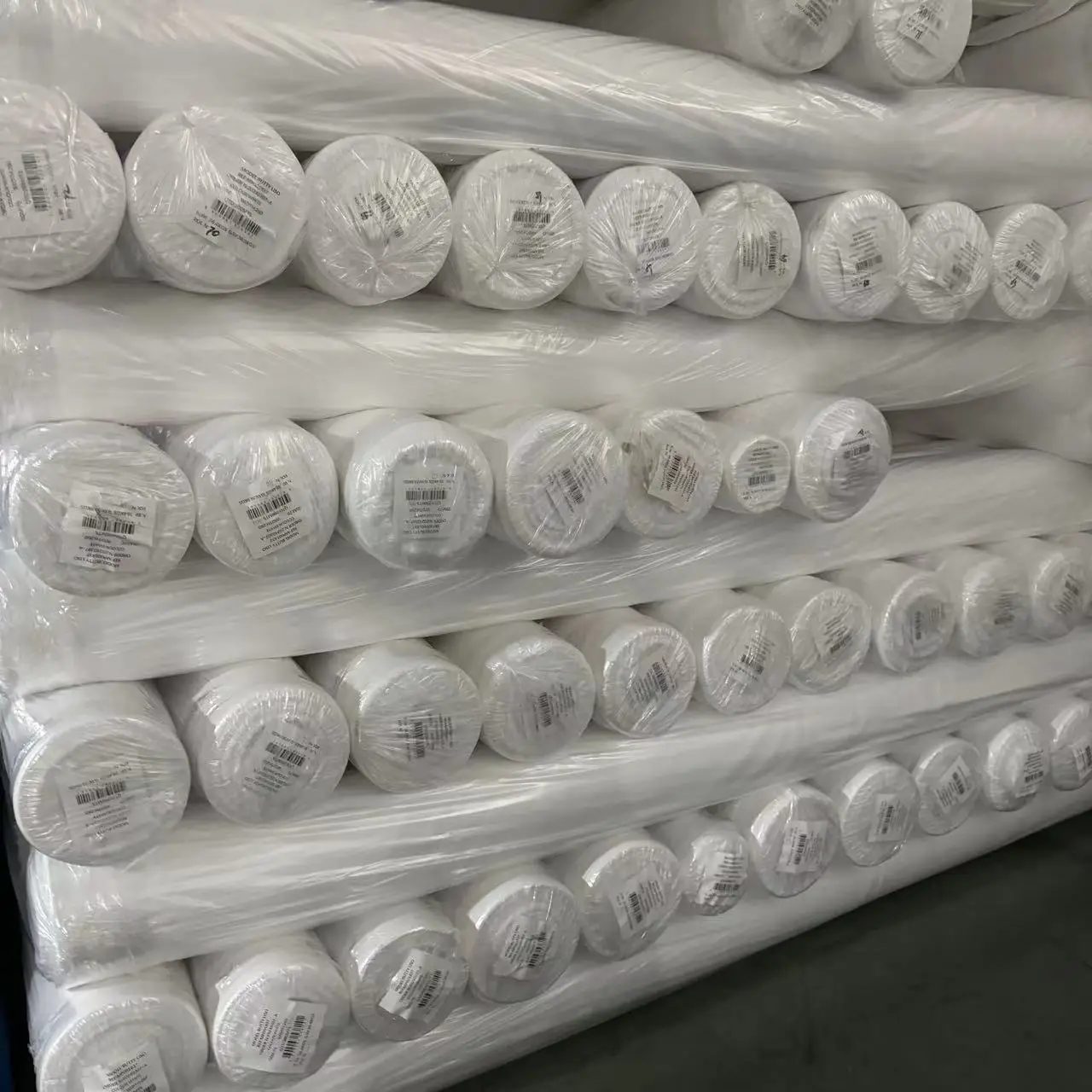 Wholesale solid 100% polyester dyed plain woven microfiber fabric roll packing