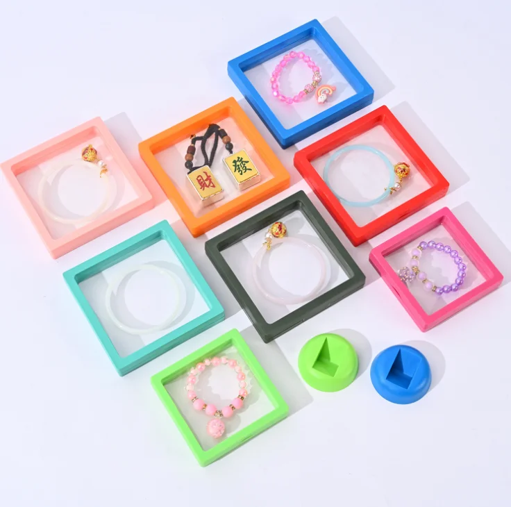 Colorful 3D custom Packaging Free Stand Plastic Floating Frame Memmbrane PE Film Display Gift Jewelry Box