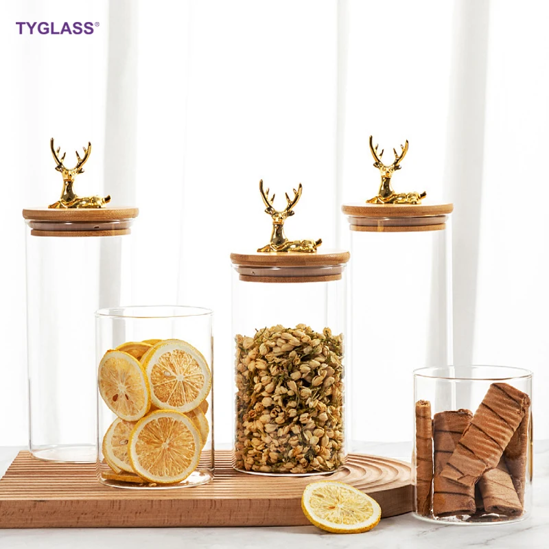 Hot sale High borosilicate large glass pumpkin jars custom stripe glass storage jar with an elk bamboo wooden lids for kitchen