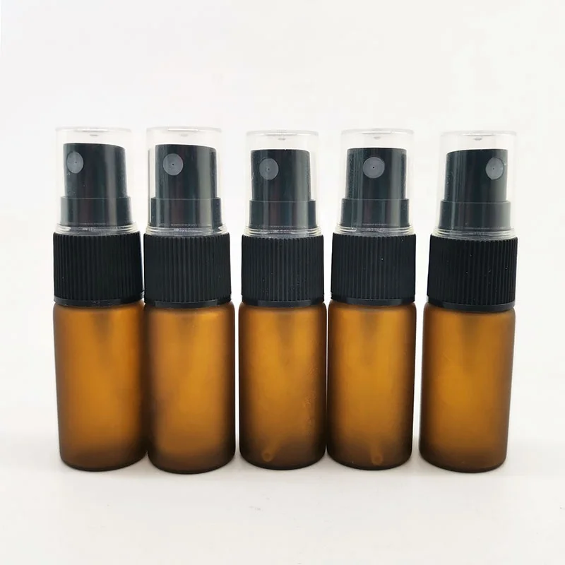 Wholesale empty 10 ml frosted amber spray glass bottle for essential oil in personal caring with black spray lid