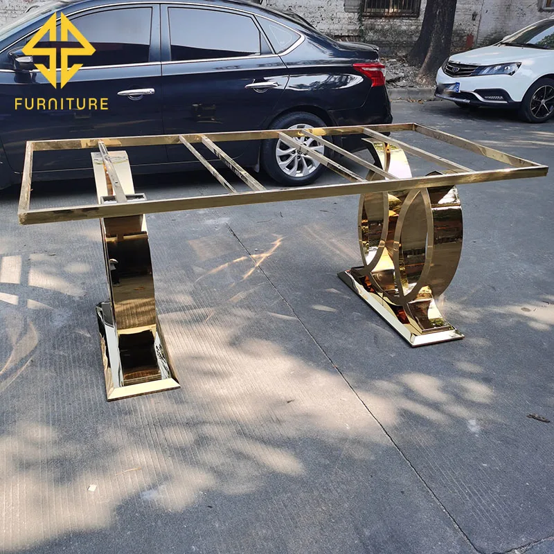 Foshan factory sells new design stainless steel golden dining table at low price, which can be matched with glass table and marb
