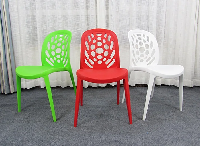 High - quality low - price manufacturers wholesale wedding banquet activities plastic chair can be stacked hole hole chair