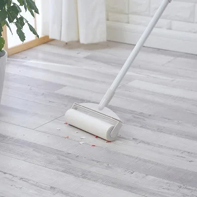 Fashionable and multi-purpose retractable lazy cleaning roller sticking device disposable sticking paper hair dust broom