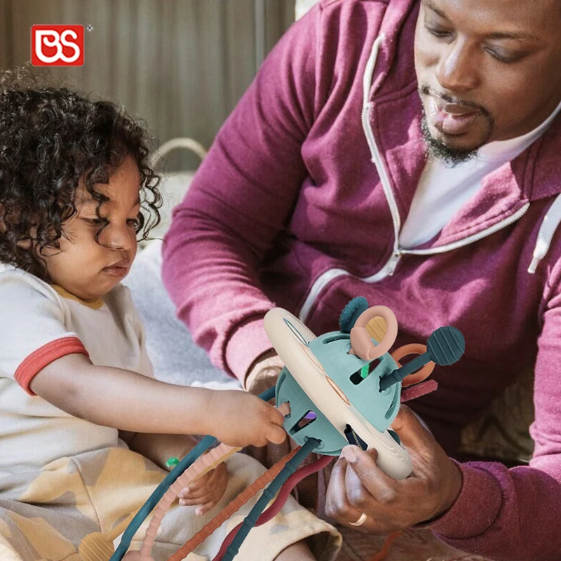 BS Toy Toddler Learning Sensory Development Silicone Pull Flying Saucer Shape String Music Other Baby Teether Toy For Sale