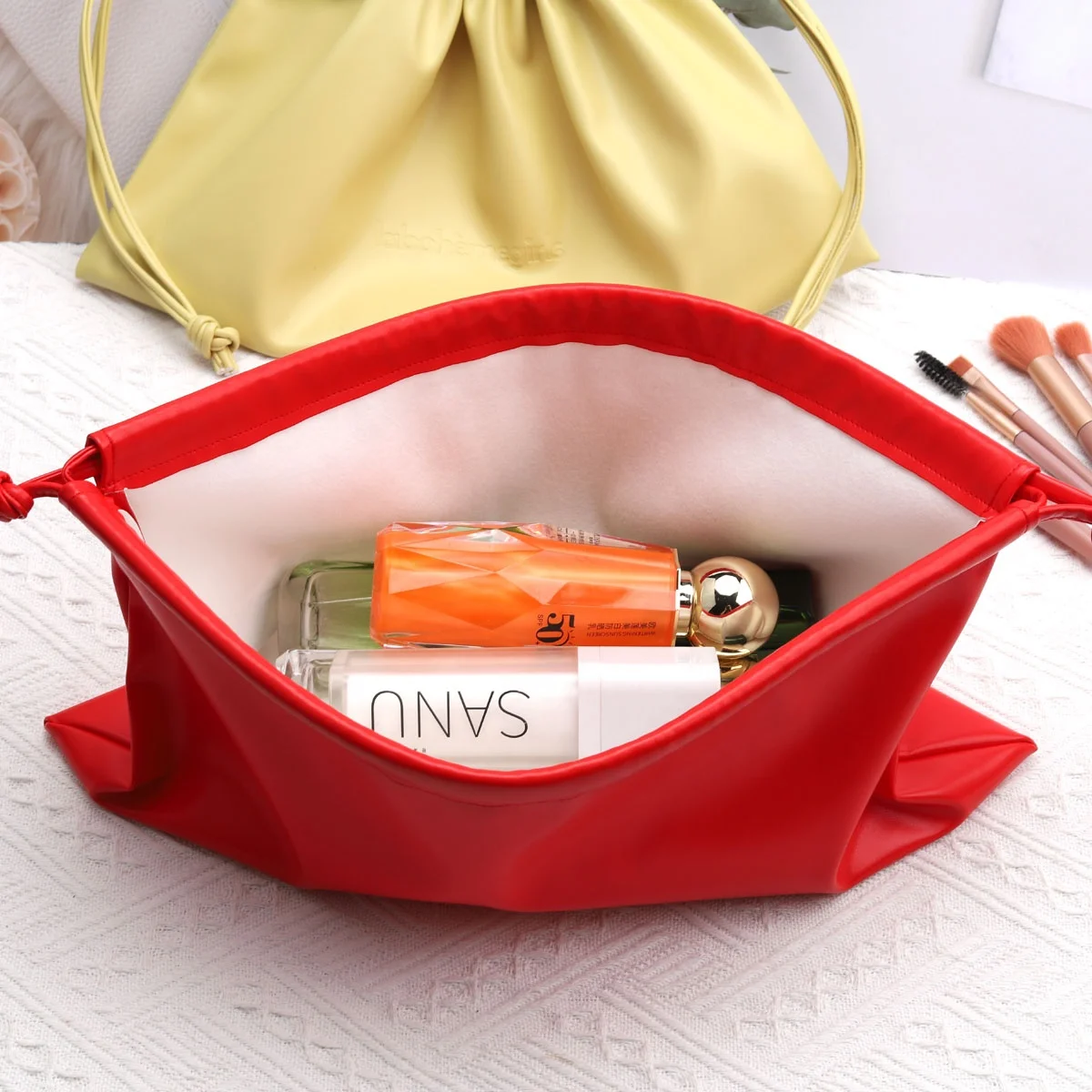 OEM Hot Sale Emboss Waterproof Pu Leather Drawstring Cosmetic Bag Custom Promotion Shoe Swimsuit Makeup Packing Leather Pouch
