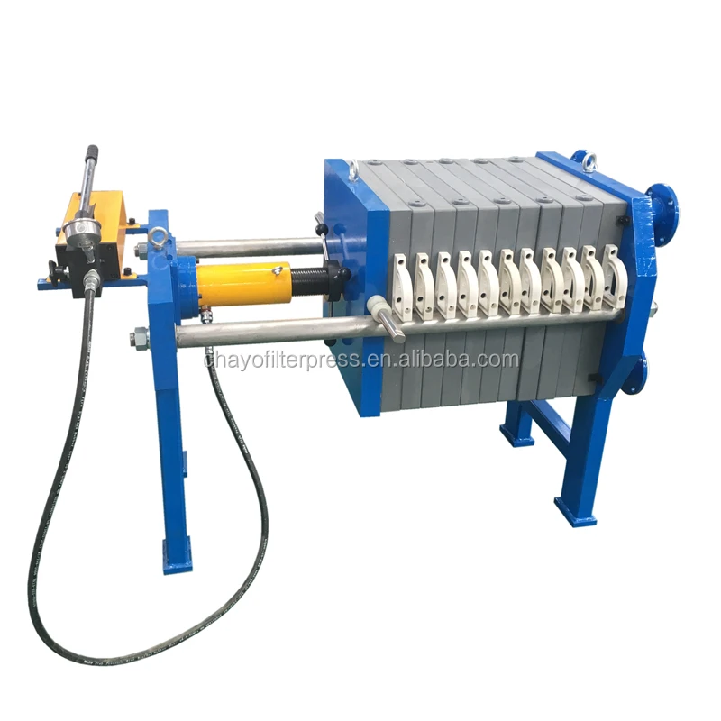 Hand operated small olive oil filter press