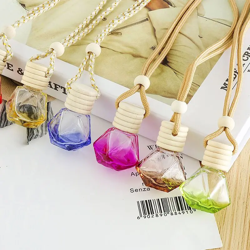 Hot selling colour 10ml car use perfume bottle mini pendant glass bottle aromatherapy bottles with wooden cover