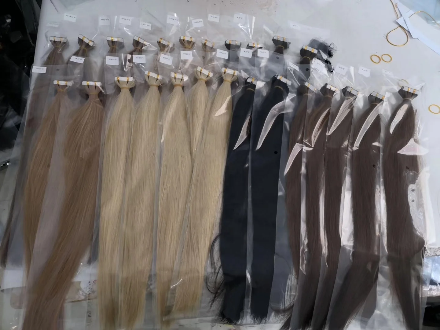 Best sale tape in hair extensions 100% human hair and raw indian temple hair in stock