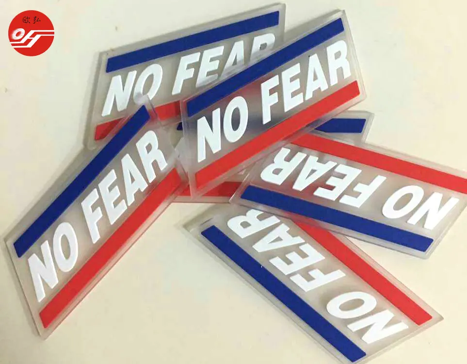 High quality embossed logo transparent PVC rubber patch  PVC rubber 3d patch for clothing