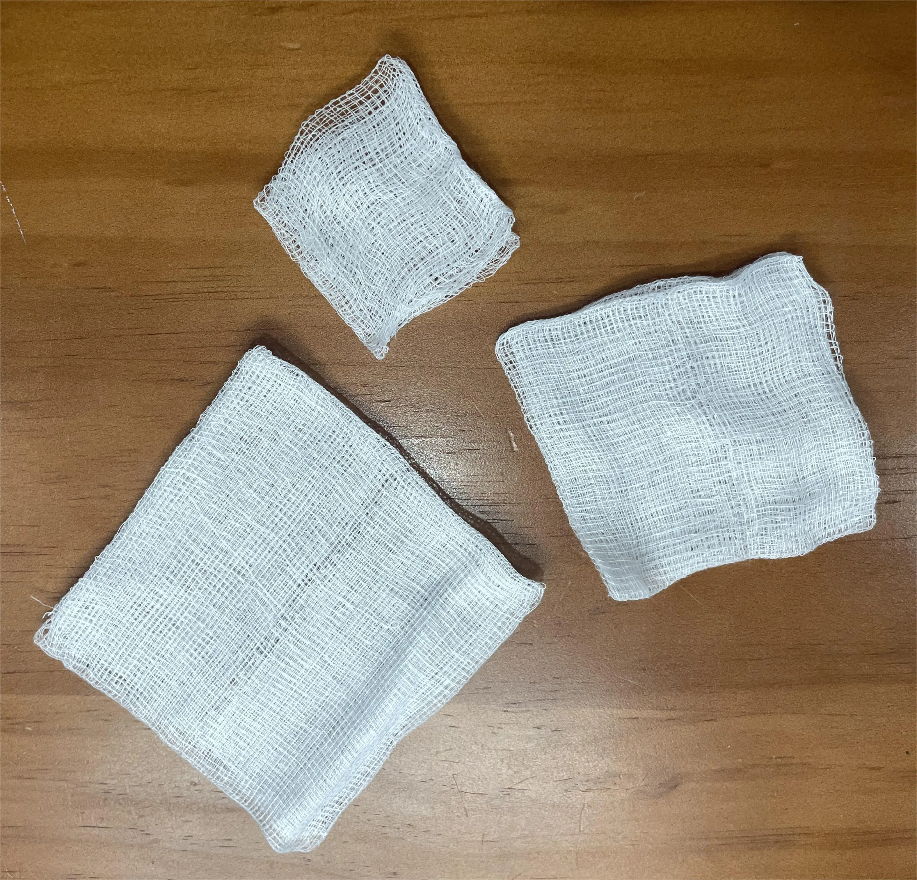Cheap price disposable medical consumables sterile non-woven gauze pad
