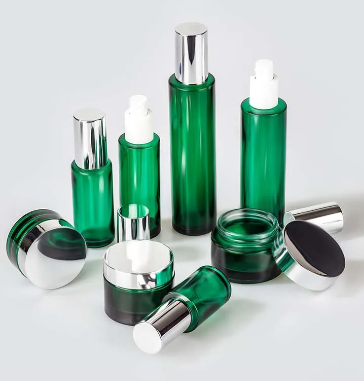 Empty luxury  matte lotion spray pump bottles custom glass cream jars gloss green jars cosmetic glass jar bottle with screw lids