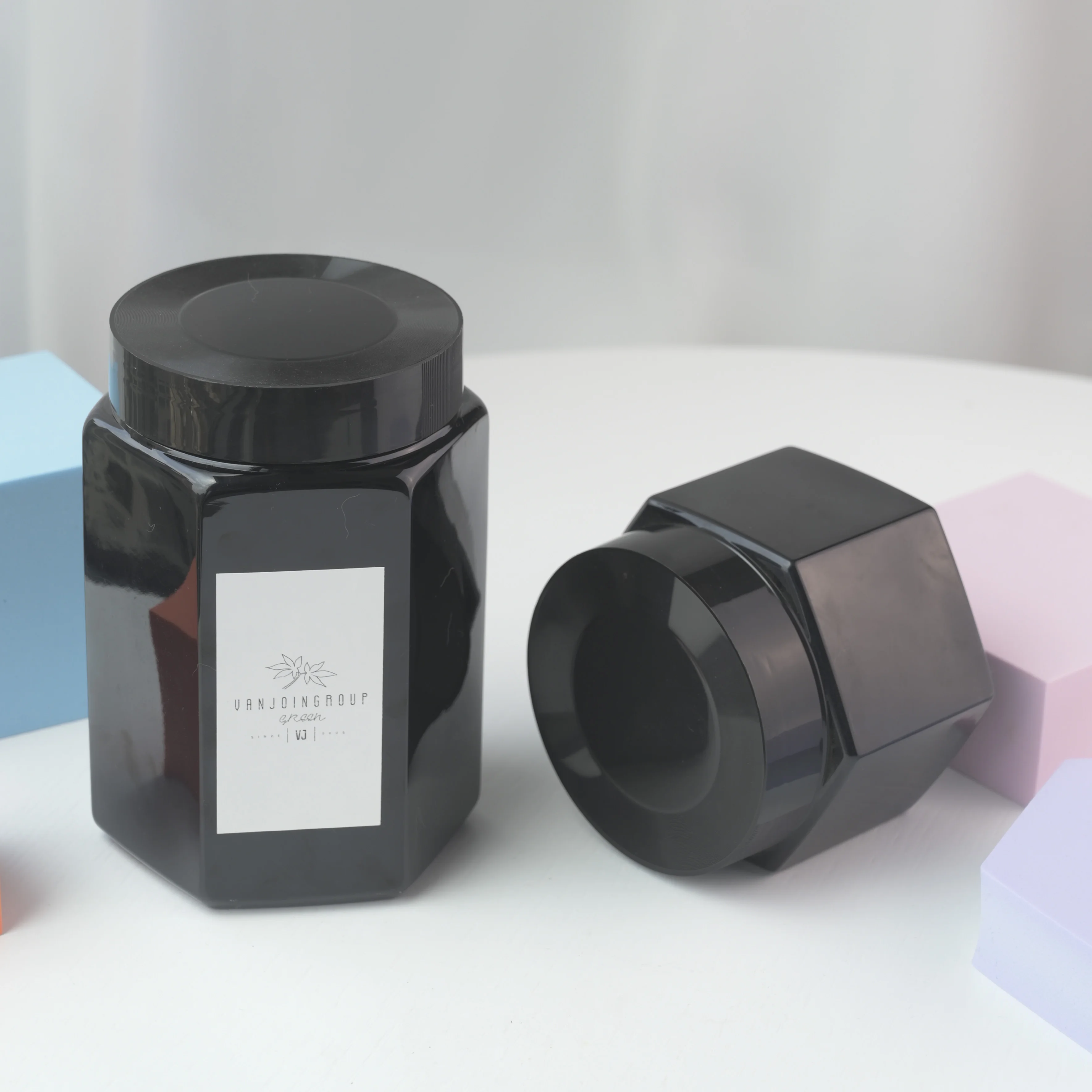 Wholesale amber color hexagon shape 500g 1000g pet plastic honey jar with Airtight Lids