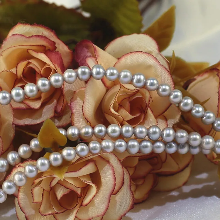 Wholesale freshwater pearls 5-6mm best grade silver color near round  cultured pearl necklace strand