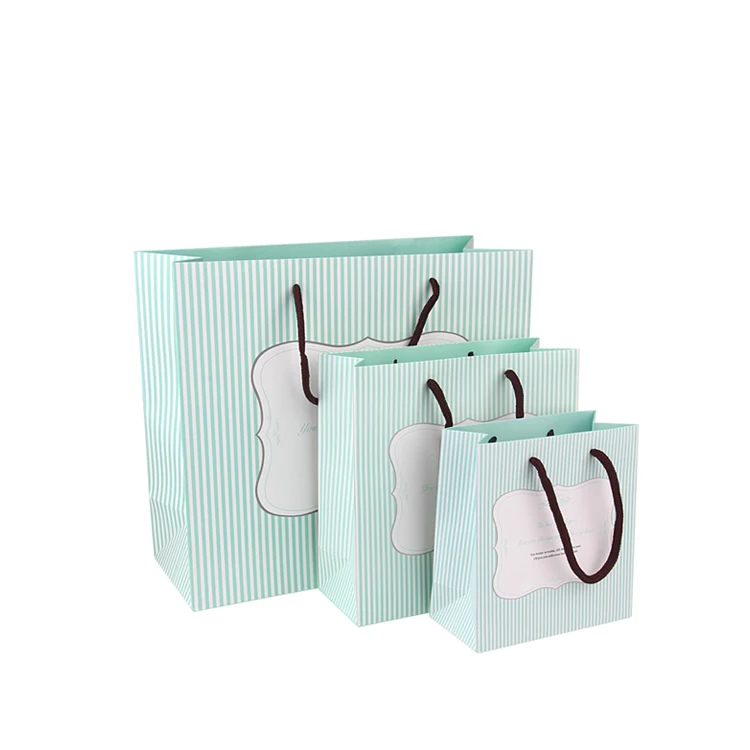 Сделанный на заказ розовый бумажный пакет с собственным логотипом и ручкой из полипропилена