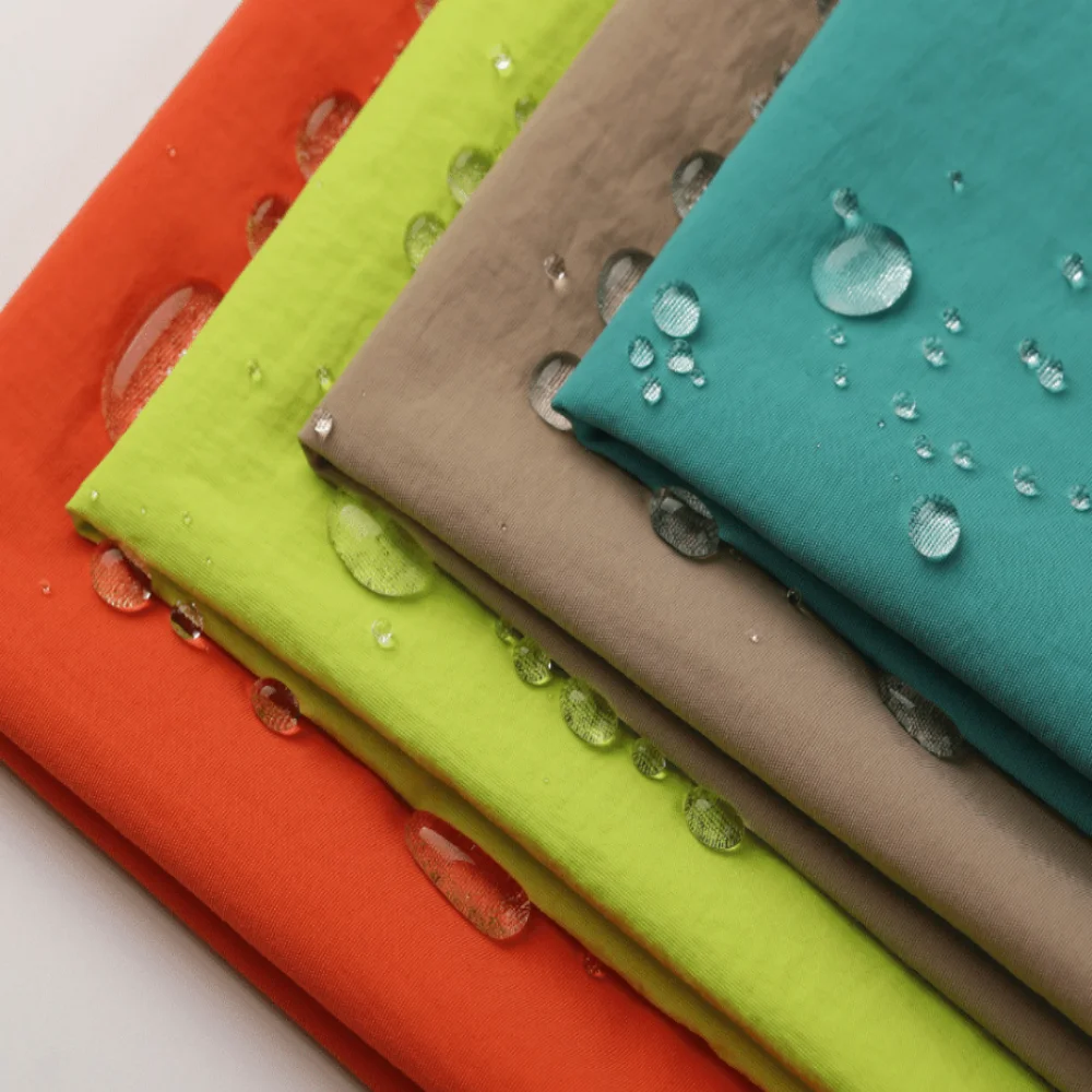 Nylon Full Matte Warp Elastic Taslon Stretch Waterproof Beach Pants Plain Twill TPU bonding Fabric.