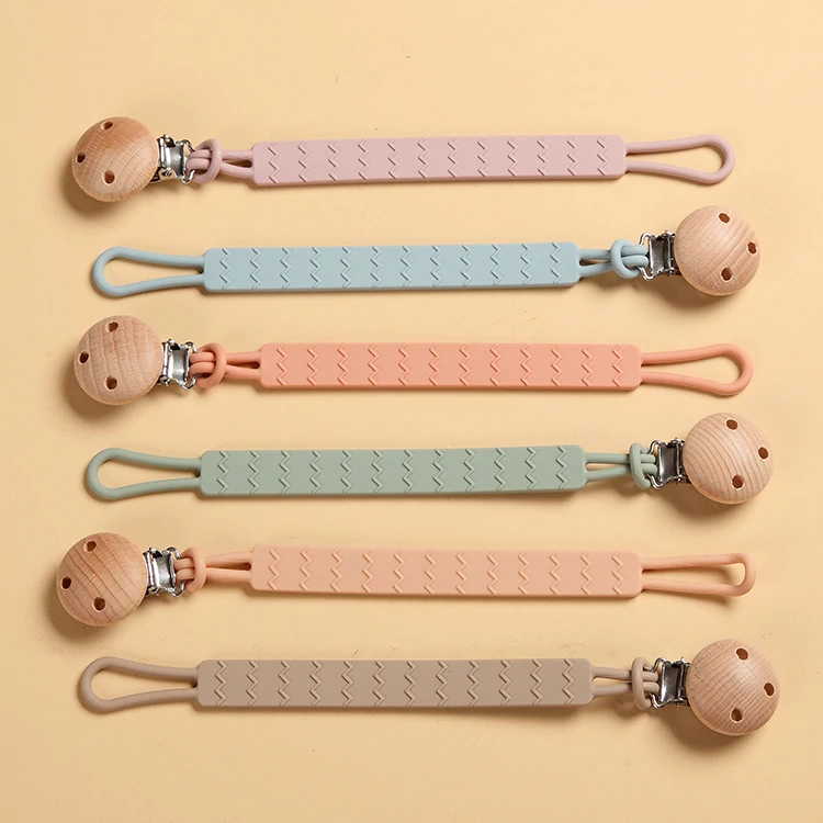 Hot selling wooden clasp silicone pacifier clip for 6 months old baby