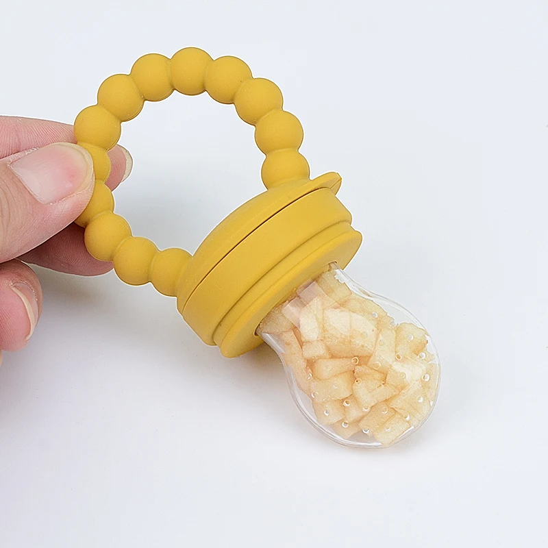 Wholesale Oem Funny Tooth Design Eco Silicone Bpa Free New Born Baby Food Fruit Pacifier Fresh Food Feeding Nipple Baby Pacifier