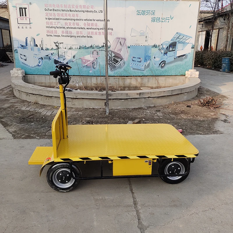 Customized station driving type reverse riding electric flat 4 wheel truck warehouse plant hauler